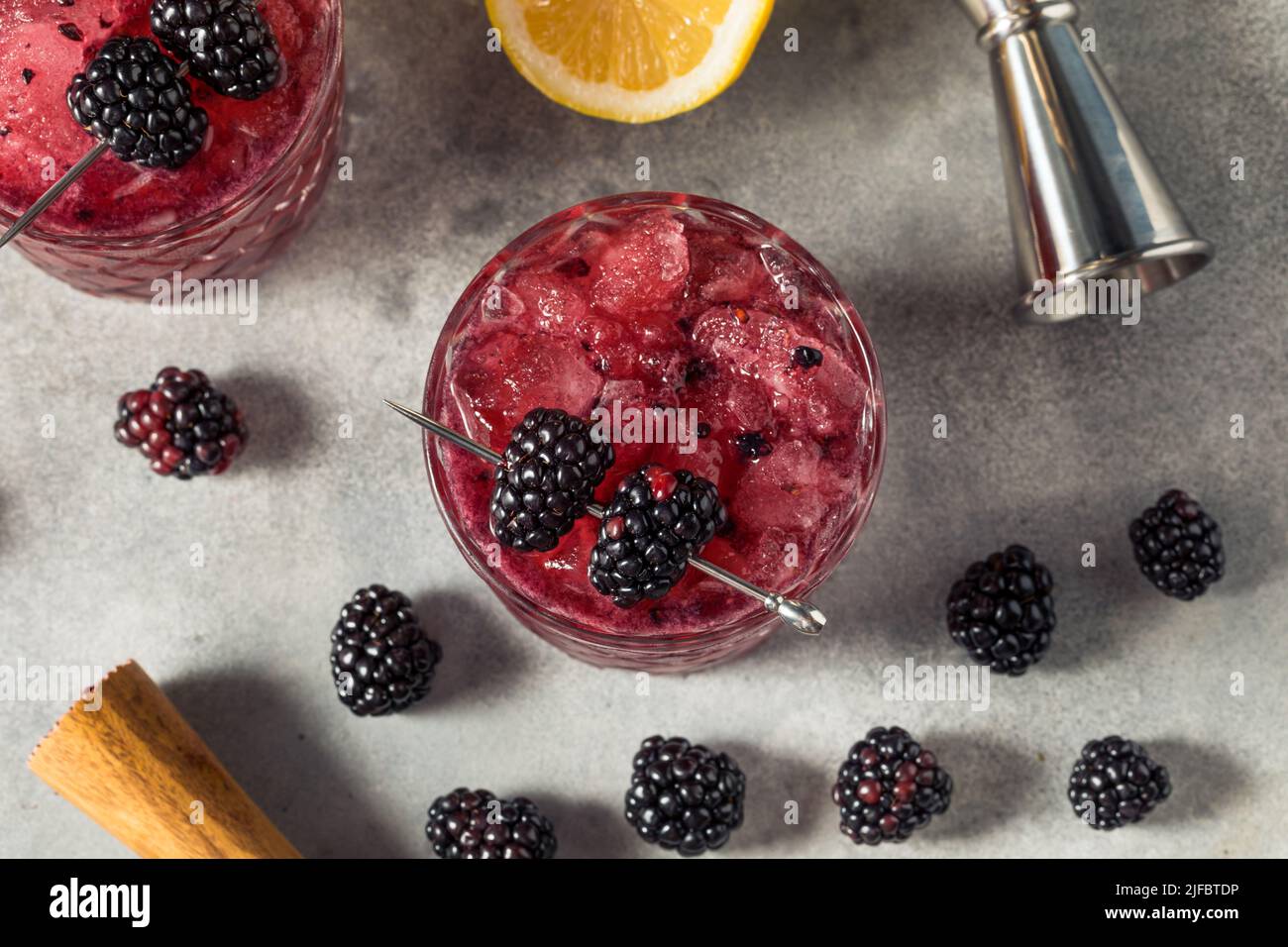 Boozy Refreshing Bramble Blackberry Cocktail with Vodka and Lemon Stock Photo