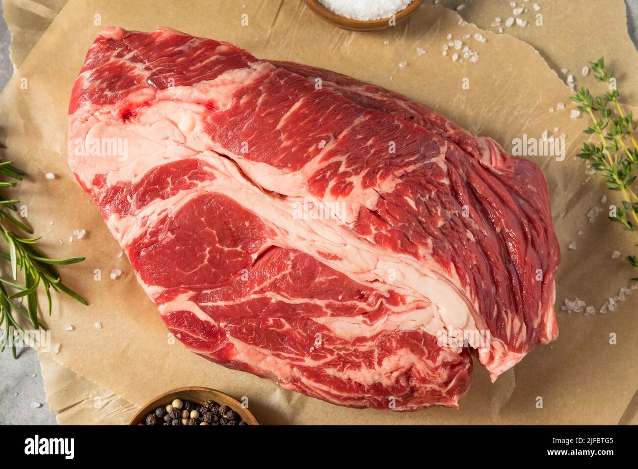 Raw Organic Grass Fed Chuck Roast with Salt and Pepper Stock Photo Alamy