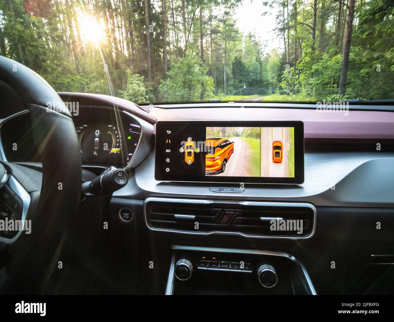 Minsk, Belarus - June 2022: Geely SUV media system screen Geely Coolray car. Stock Photo