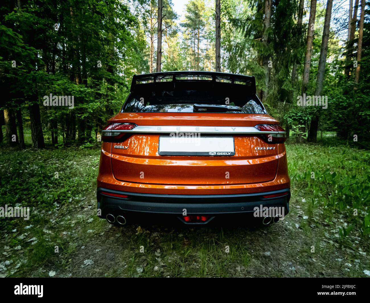Minsk, Belarus - June 2022: Orange Geely Coolray car. Stock Photo