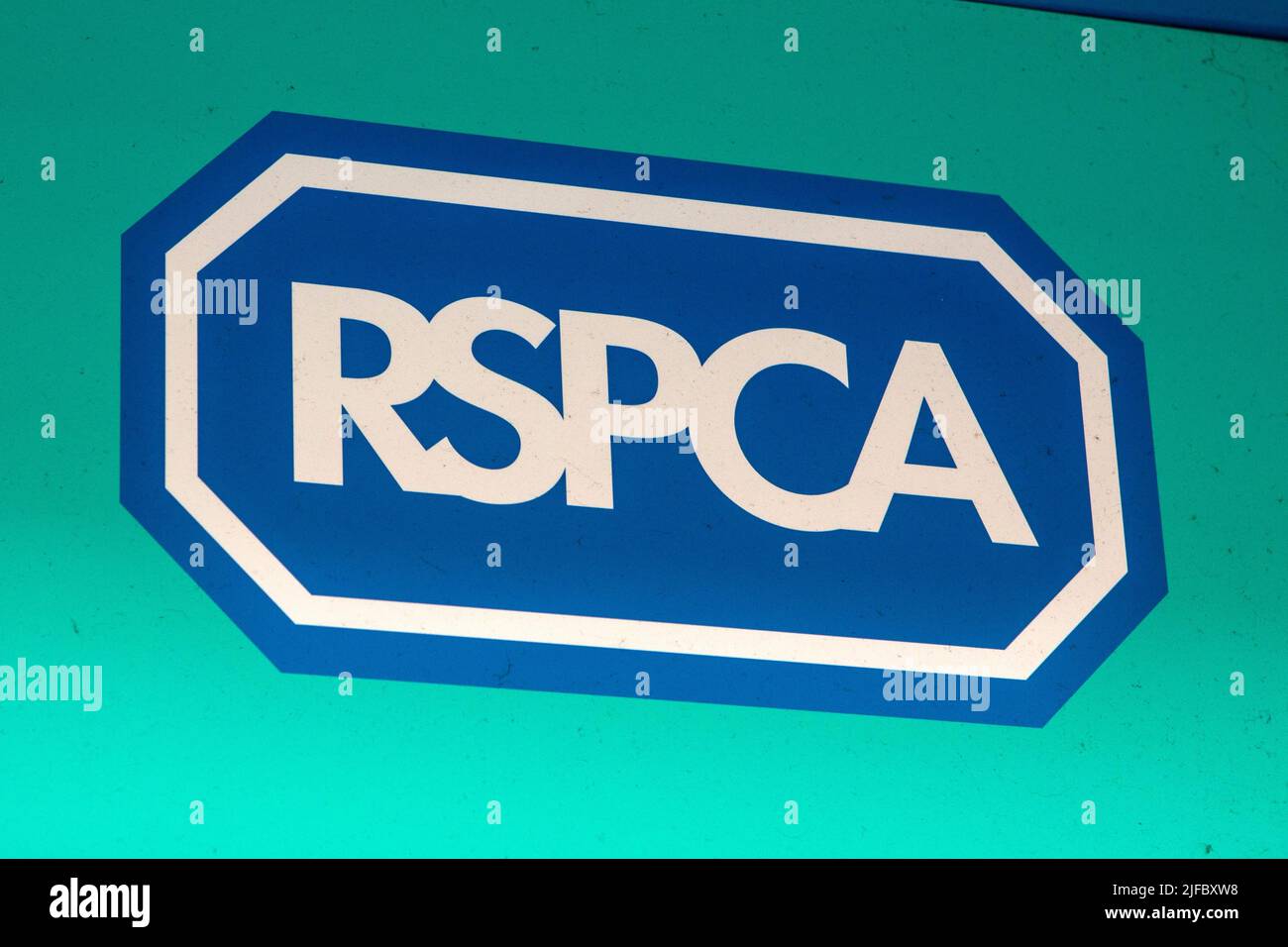 Norfolk, UK - May 16th 2022: Close-up of the RSPCA sign on the exterior of a charity shop in the UK. Stock Photo