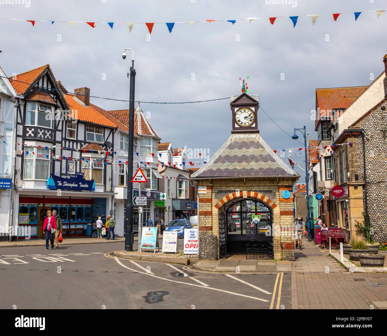 Sheringham, UK - May 16th 2022: Clock tower in the seaside town of Sheringham in Norfolk, UK. The construction was originally a water pump which suppl Stock Photo