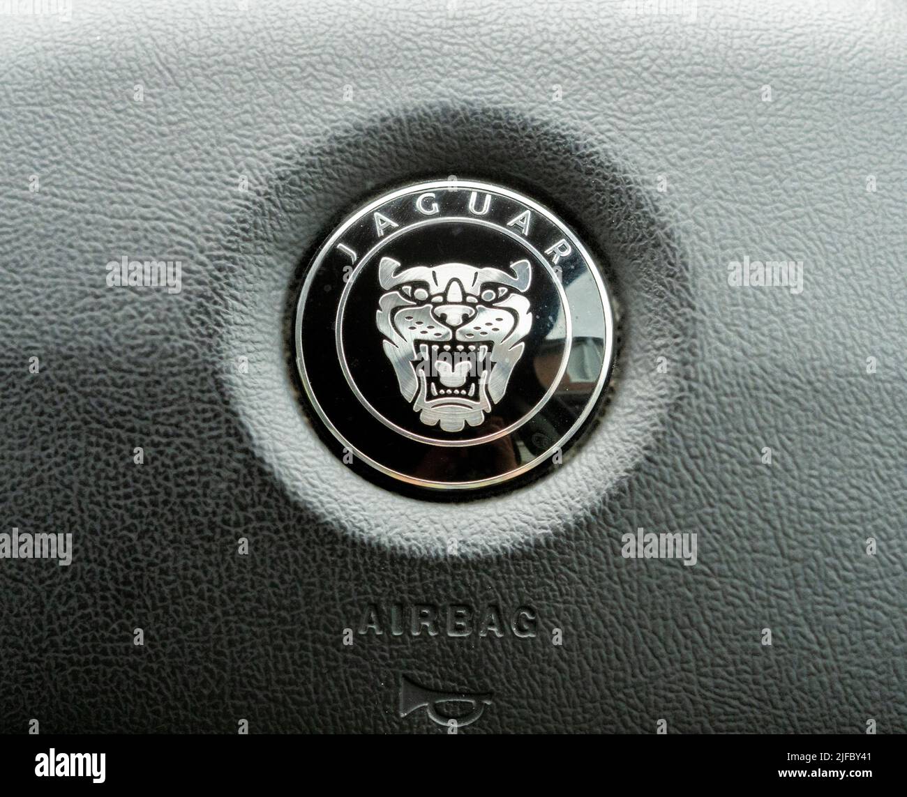 Jaguar car steering wheel badge Stock Photo Alamy