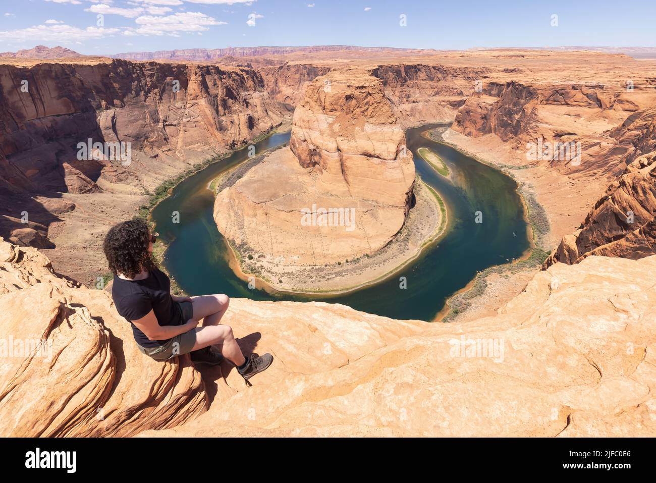 Adventurous Caucasian Woman at Horseshoe Bend in Page, Arizona, United