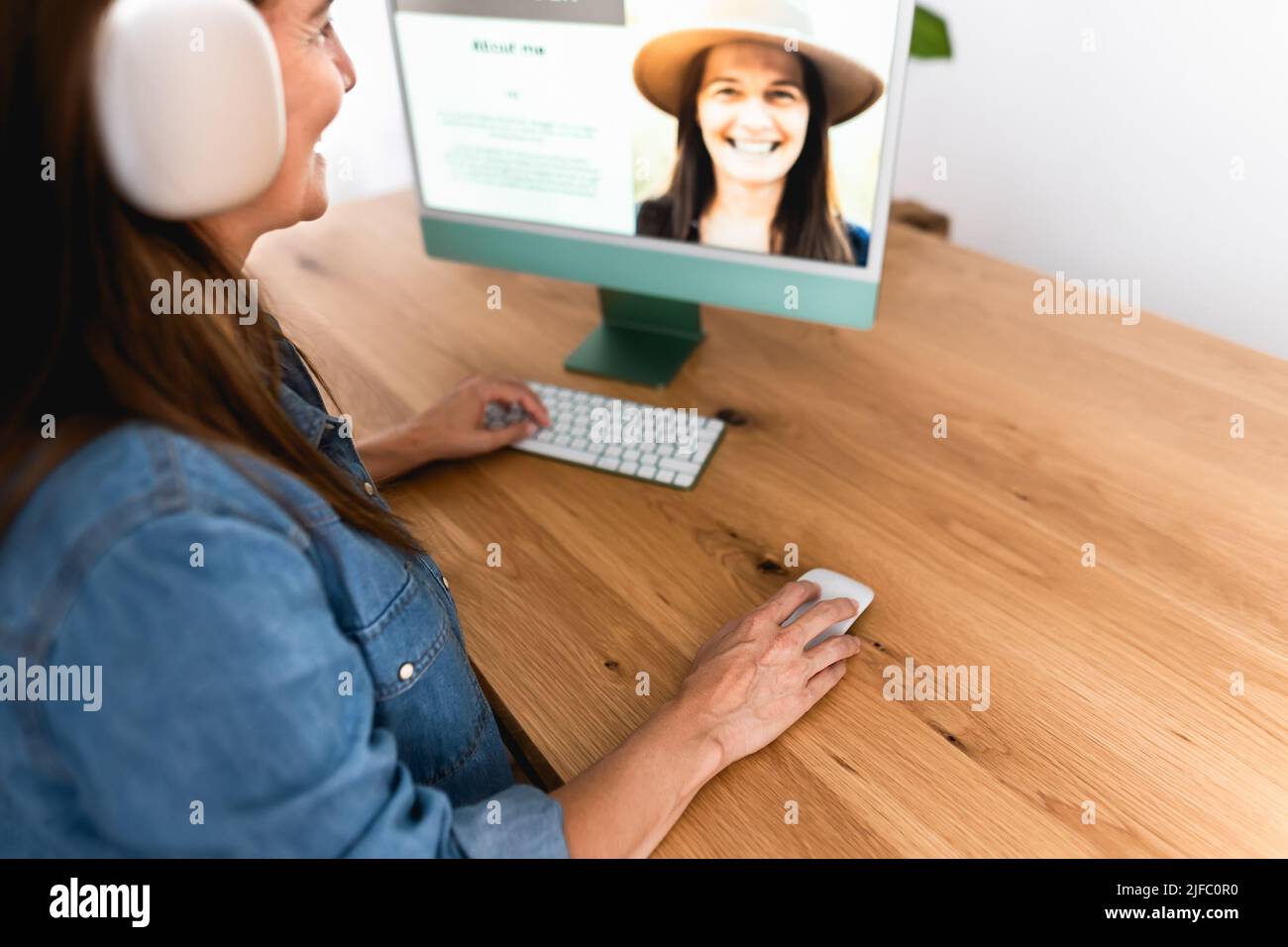 Happy social Influencer woman working on computer from her home studio - Smart work and Technology concept Stock Photo