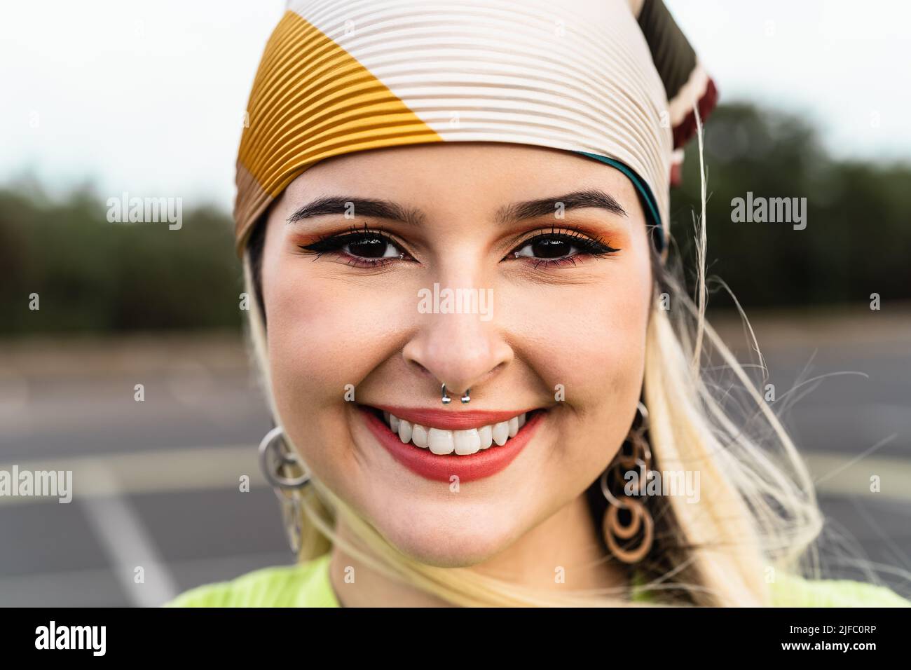 Portrait happy young girl while having fun hanging out Stock Photo