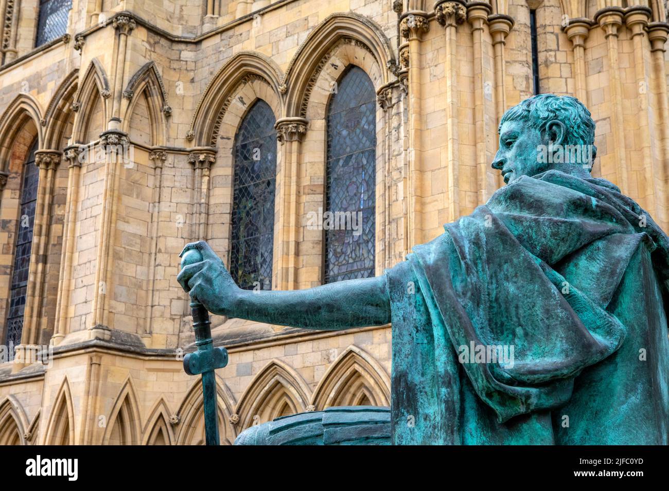 The statue of Roman Emperor Constantine the Great, with the exterior of York Minster pictured behind, in the beautiful city of York, UK. Stock Photo