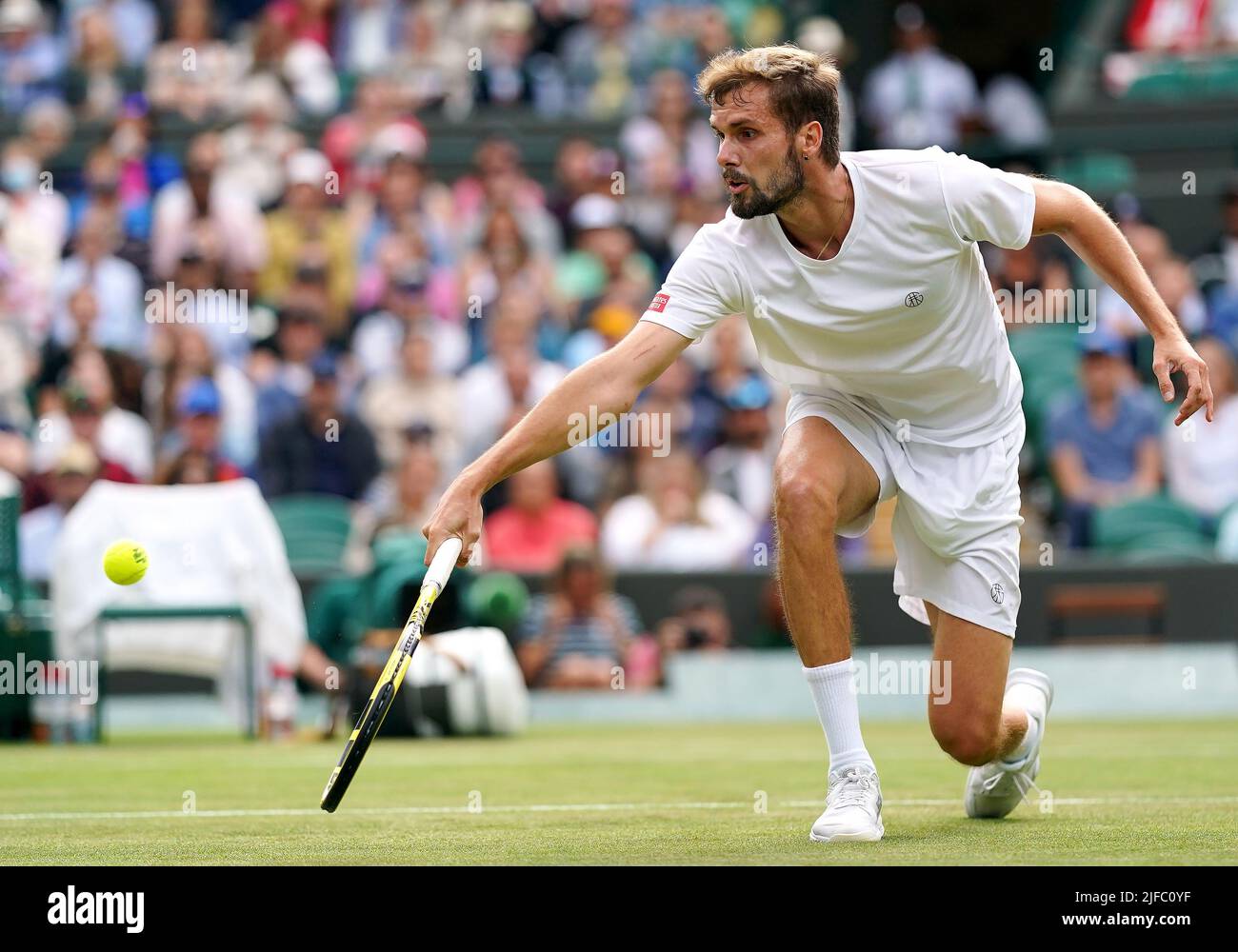 Oscar Otte in action against Carlos Alcaraz during day five of the 2022 Wimbledon Championships at the All England Lawn Tennis and Croquet Club, Wimbledon. Picture date: Friday July 1, 2022. Stock Photo