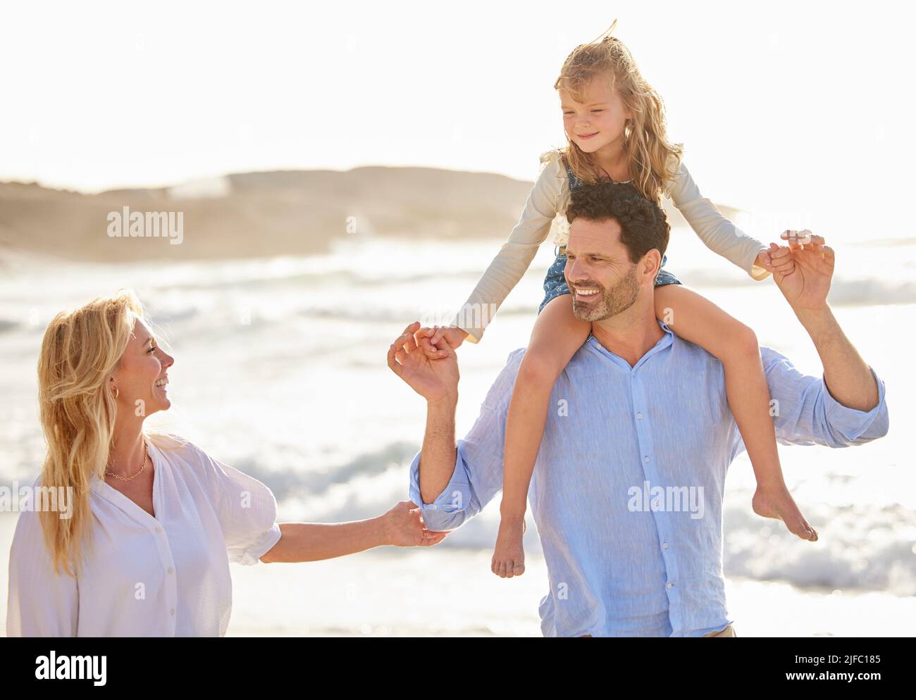 Man shoulder carrying woman hi-res stock photography and images - Alamy