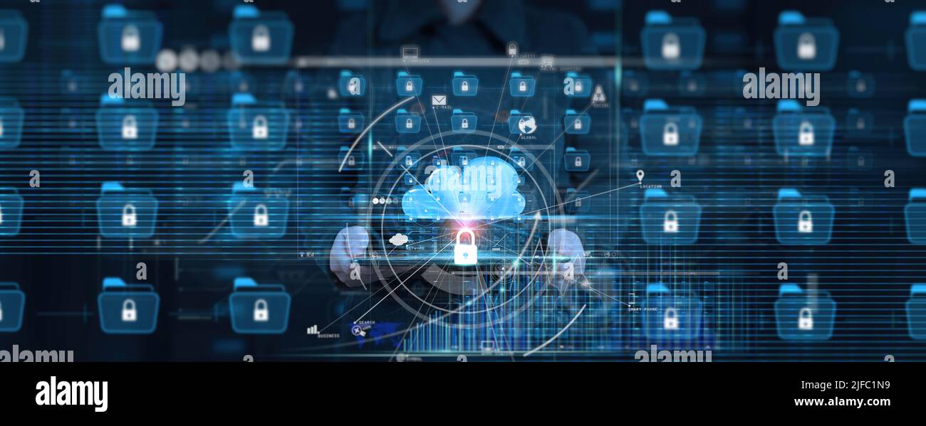 Businesswoman using digital tablet computer for protecting data document personal information on virtual interface.Cyber security network.Internet clo Stock Photo