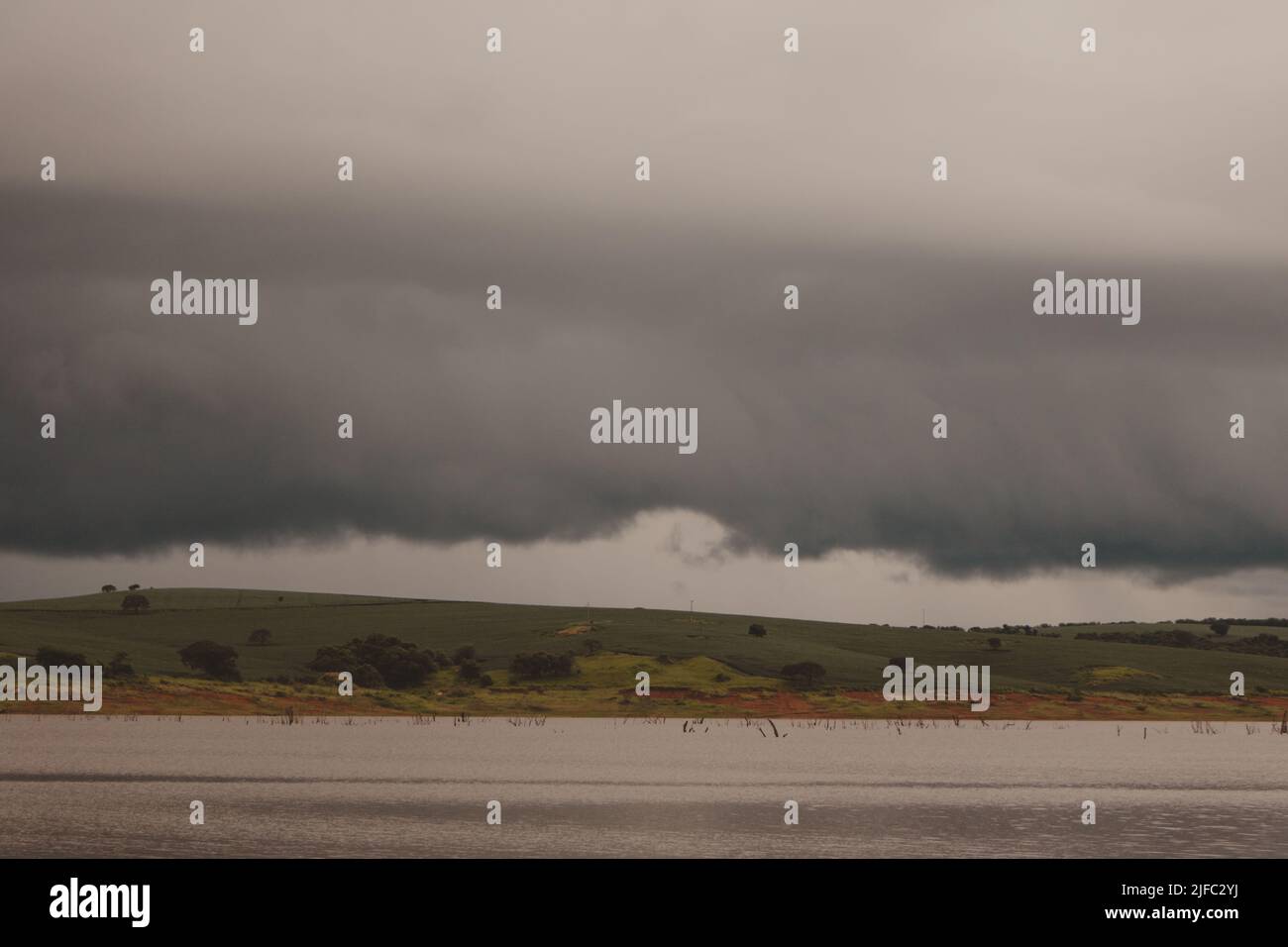 Calm river water under cloudy hi-res stock photography and images - Alamy