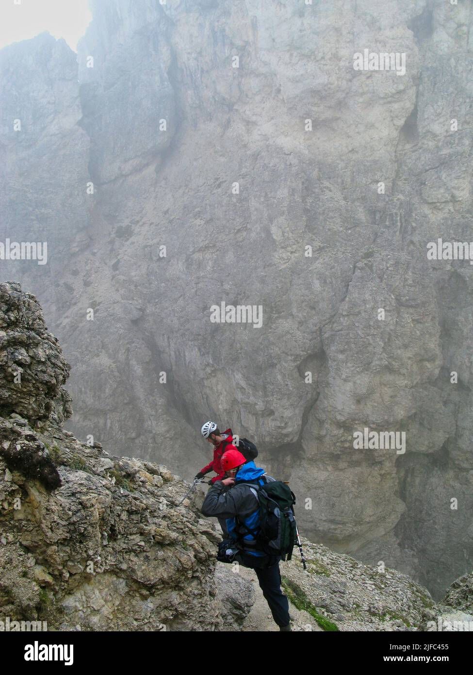 Mountaineers climbing in the Dolomite mountains - Italy Stock Photo - Alamy