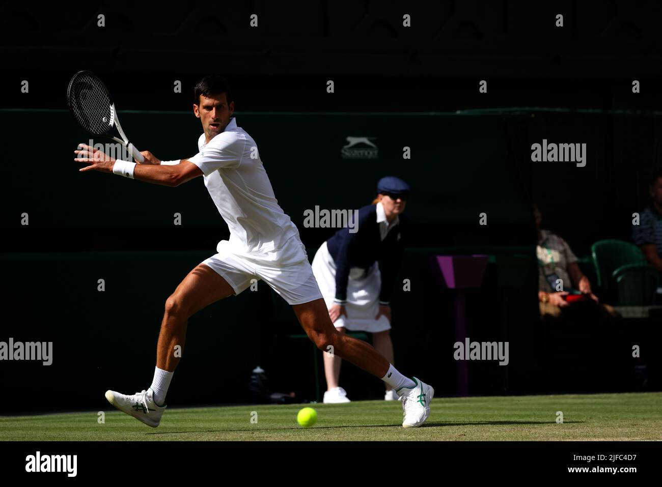Novak djokovic vollet hi-res stock photography and images