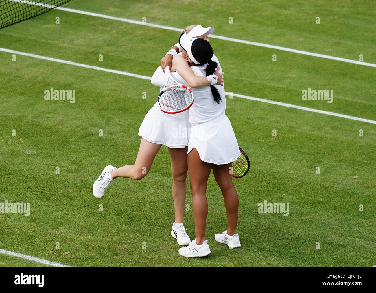 Harriet Dart and Heather Watson celebrate victory in their ladies