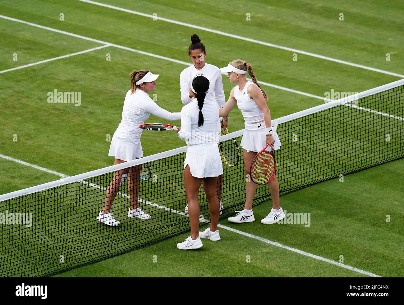 Harriet Dart and Heather Watson greet Emina Bektas and Kristina Kucova