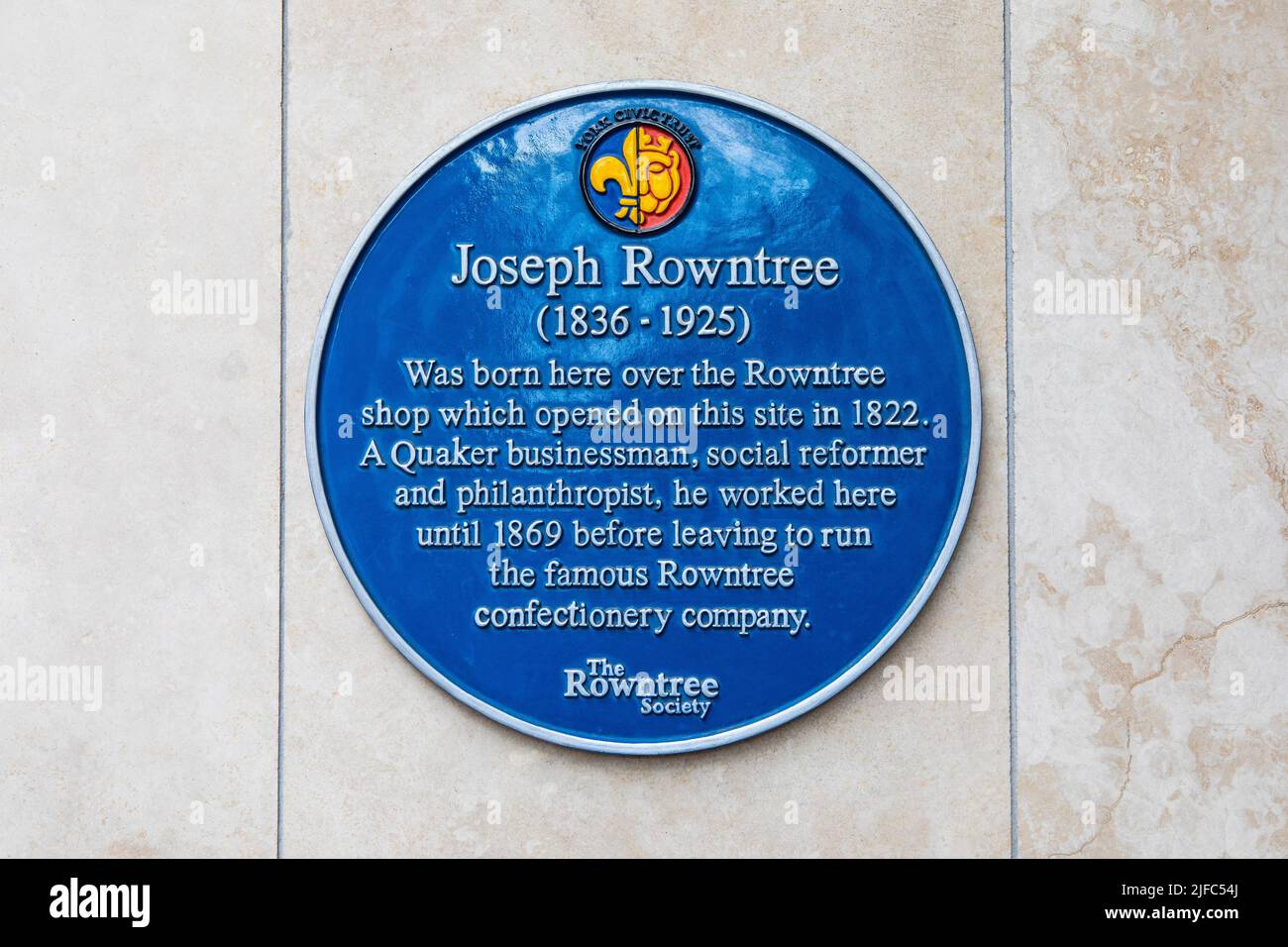 York, UK - June 6th 2022: A blue plaque in the city of York, UK, marking the location where businessman Joseph Rowntree was born. Stock Photo