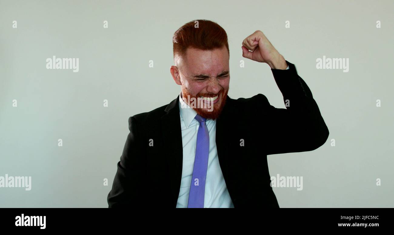 Businessman raising arms in air hi-res stock photography and images - Alamy