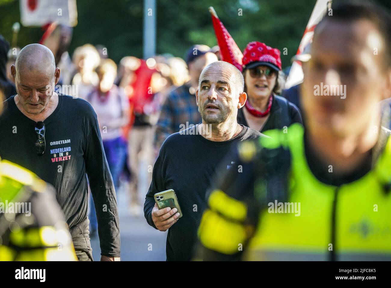 Harderwijk, Netherlands. 01st July, 2022. 2022-07-01 20:15:07 HARDERWIJK - Organizer Michel Reijinga (r) during a Walk of Freedom through the streets of Harderwijk during the protest of the Netherlands in the Resistance. The Netherlands in Resistance regularly organized protests against the corona measures during the pandemic. ANP JEROEN JUMELET netherlands out - belgium out Credit: ANP/Alamy Live News Stock Photo