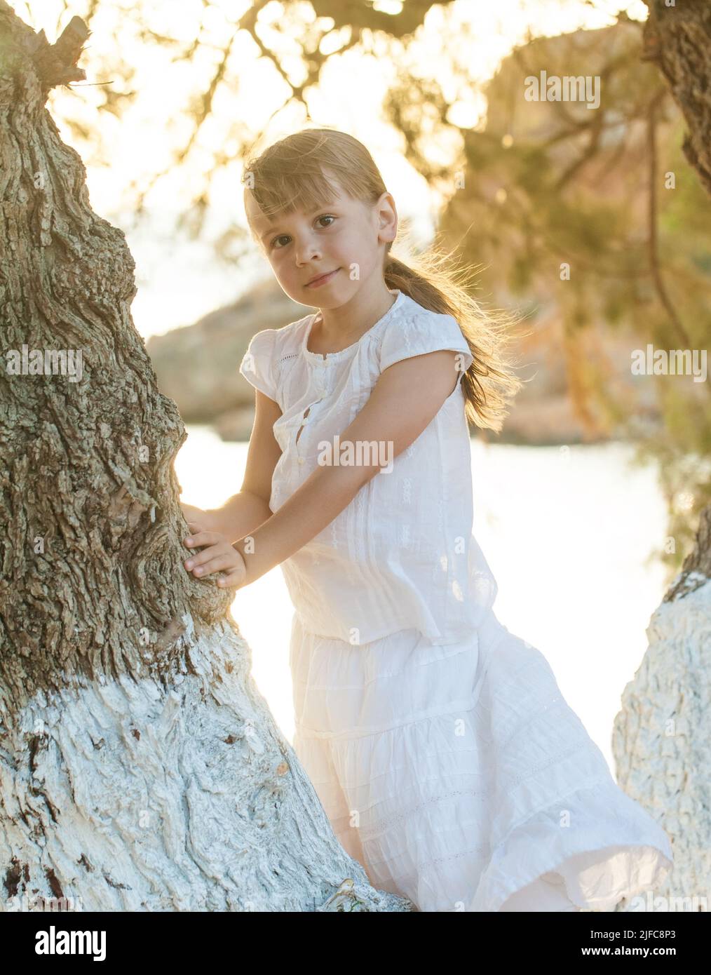 Happy little girl having fun at the park. Little child joyful portrait Stock Photo