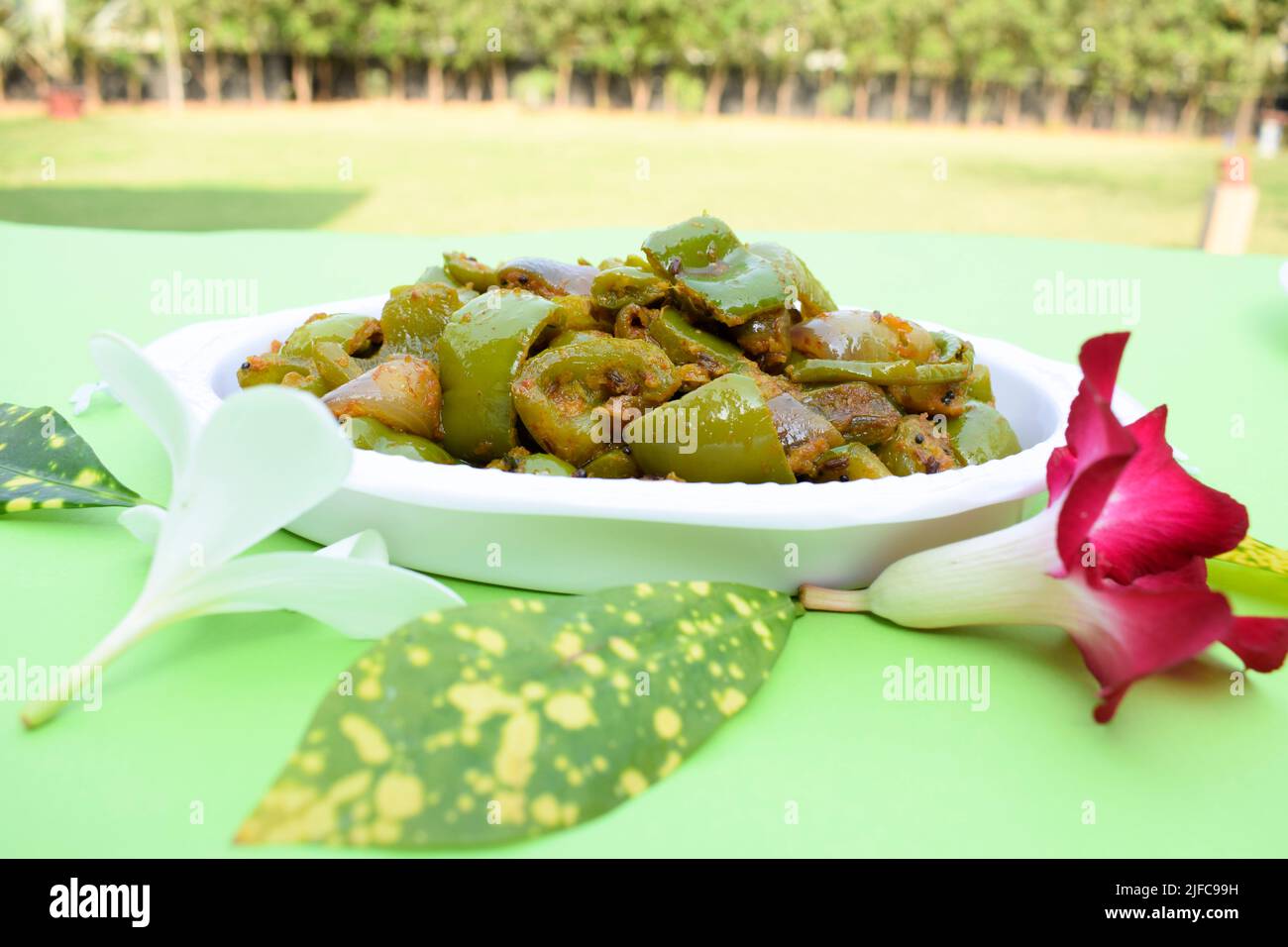 Delicious Capsicum or green bellpepper curry. Stir fried with onions