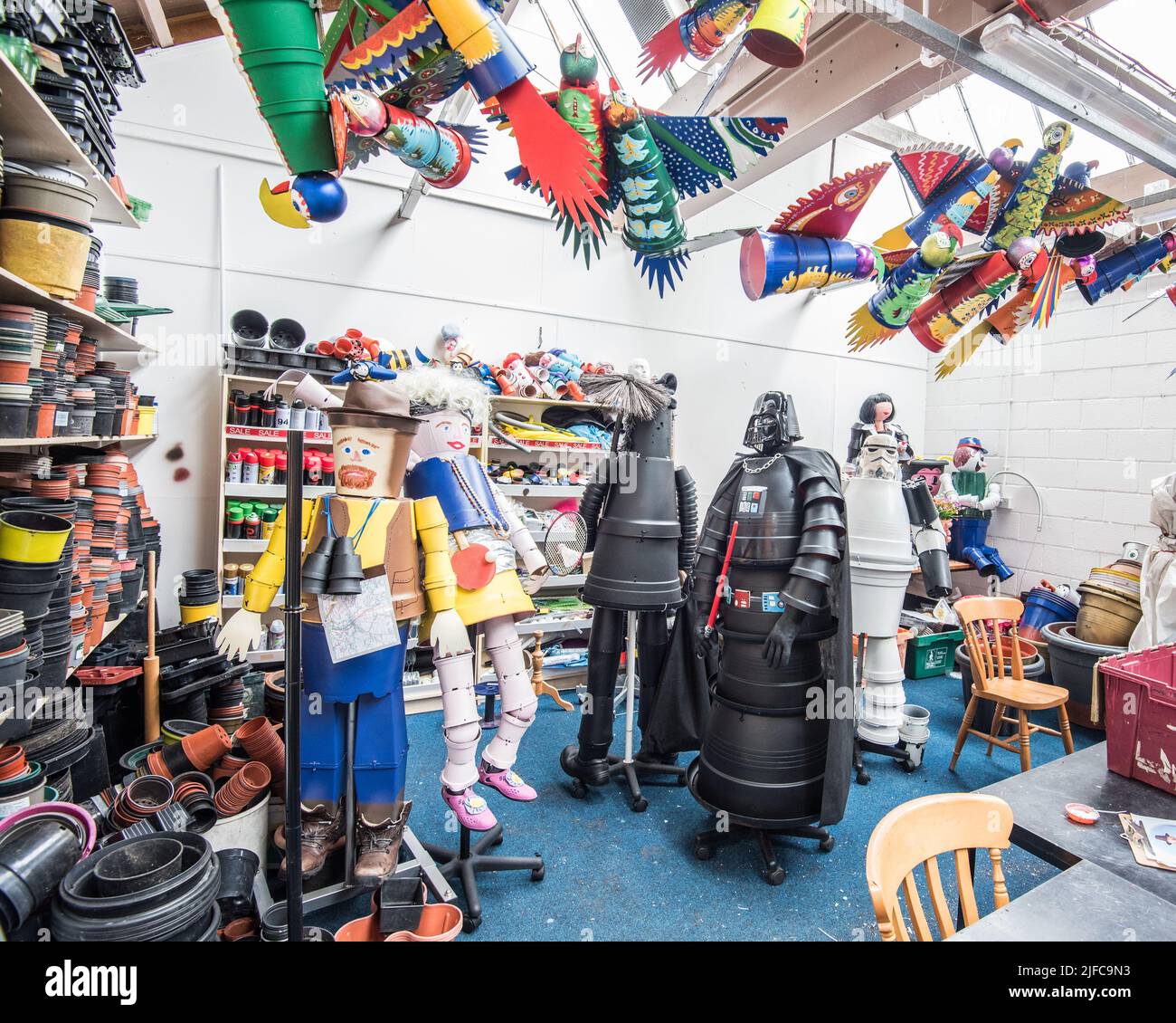 Inside the flowerpot workshop (within Watershed Mill Settle), where the next batch of creations are readied to go out, Settle Flowerpot Festival 2022. Stock Photo