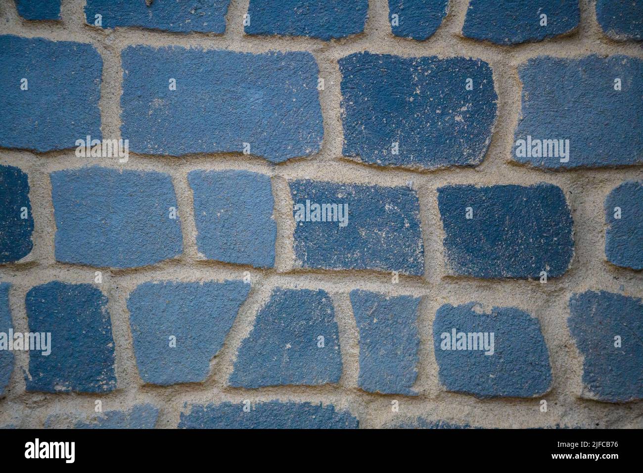 Old Wall made of Stone Blocks Stock Photo