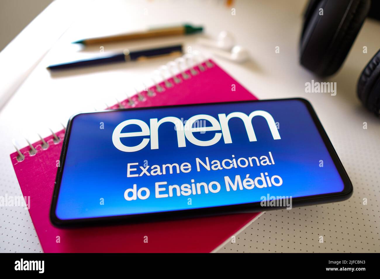 In this photo illustration the Exame Nacional do Ensino Médio (Enem) logo seen displayed on a smartphone screen. (Photo by Rafael Henrique / SOPA Images/Sipa USA) Stock Photo