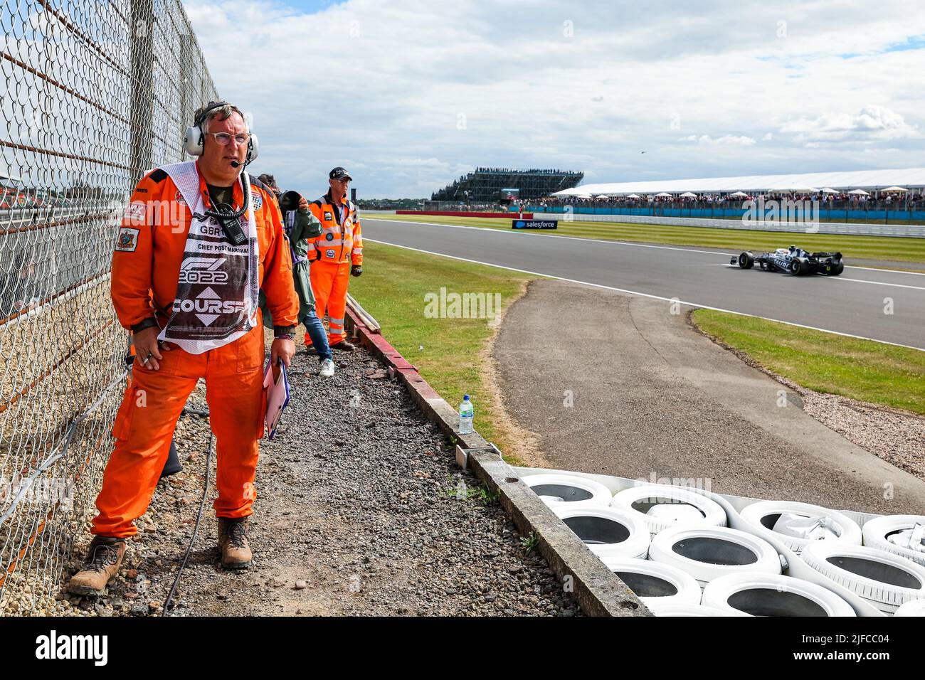 Marshals watching the cars during the Formula 1 Lenovo British Grand Prix 2022, 10th round of the 2022 FIA Formula One World Championship, on the Silverstone Circuit, from July 1 to 3, 2022 in Silverstone, United Kingdom - Photo: Florent Gooden / Dppi/DPPI/LiveMedia Stock Photo