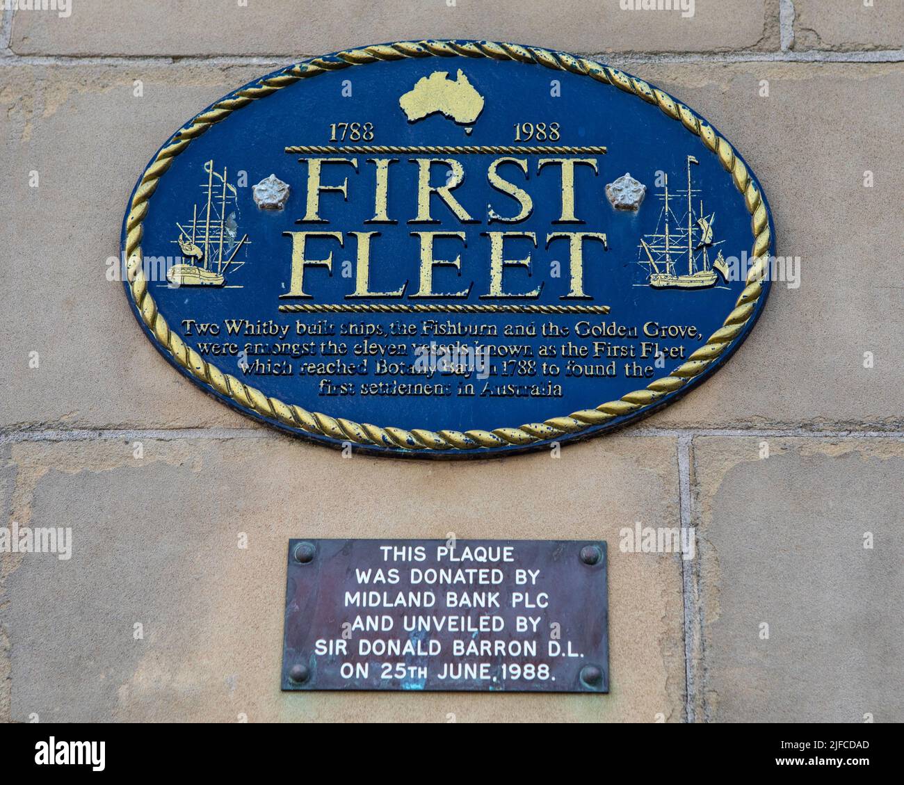 Whitby, UK - June 10th 2022: Plaque in Whitby, Yorkshire, commemorating two Whitby-built ships among the 1st vessels to reach Botany Bay and found the Stock Photo