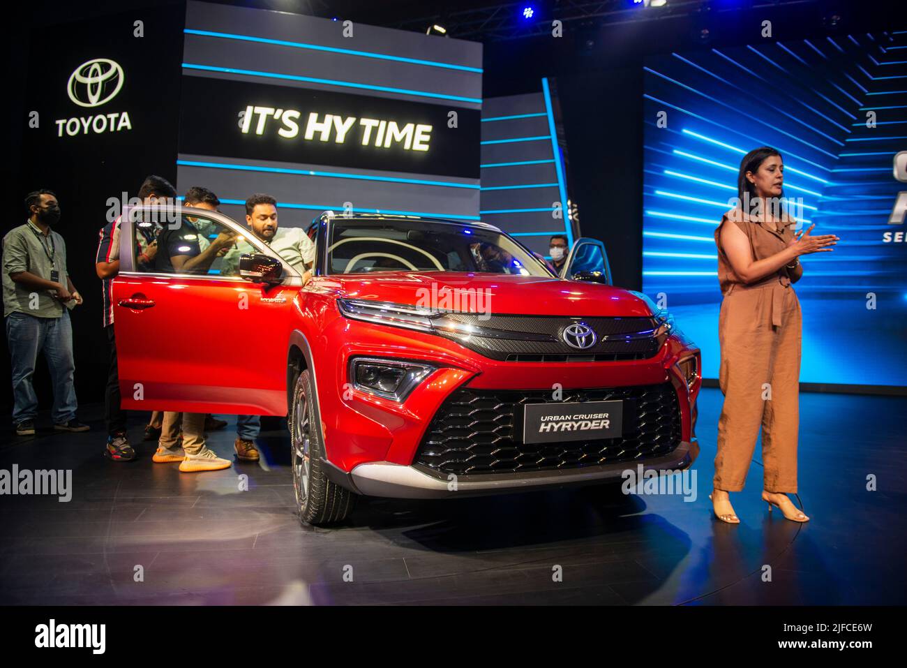 Press reporters seen around the vehicle during the launch. Toyota unveiled the new Urban Cruiser Hyryder at Hyatt Aerocity, Toyota’s first Self-charging Strong Hybrid Electric SUV and the first of its kind, in the B SUV segment in India. Stock Photo