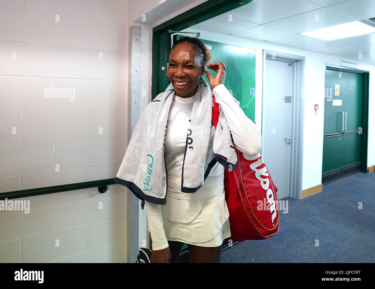 Venus Williams celebrates in the mixed doubles match against Alicja