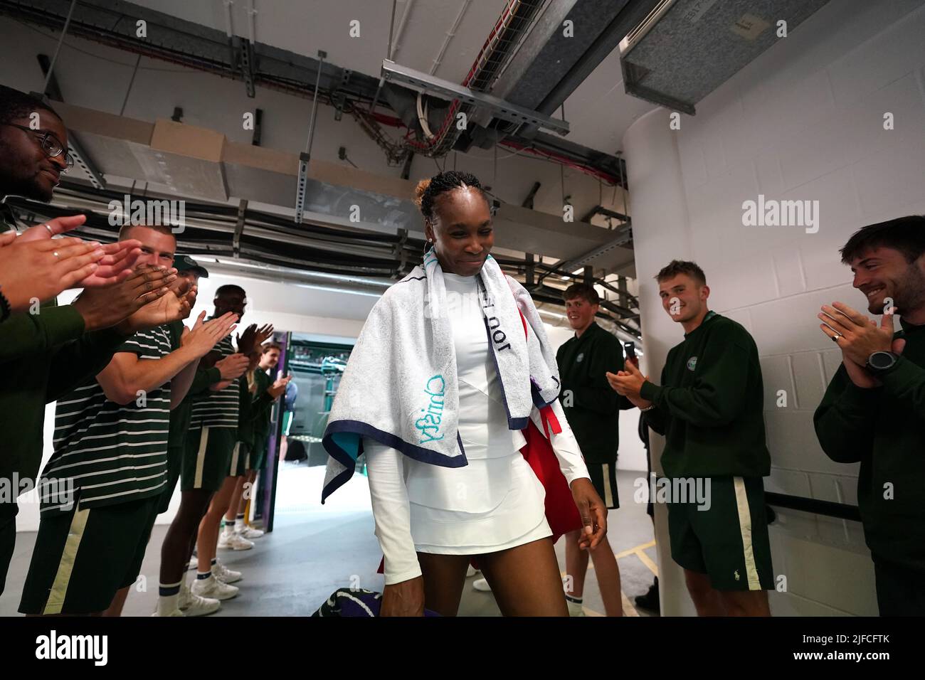 Venus Williams celebrates victory in the mixed doubles match against