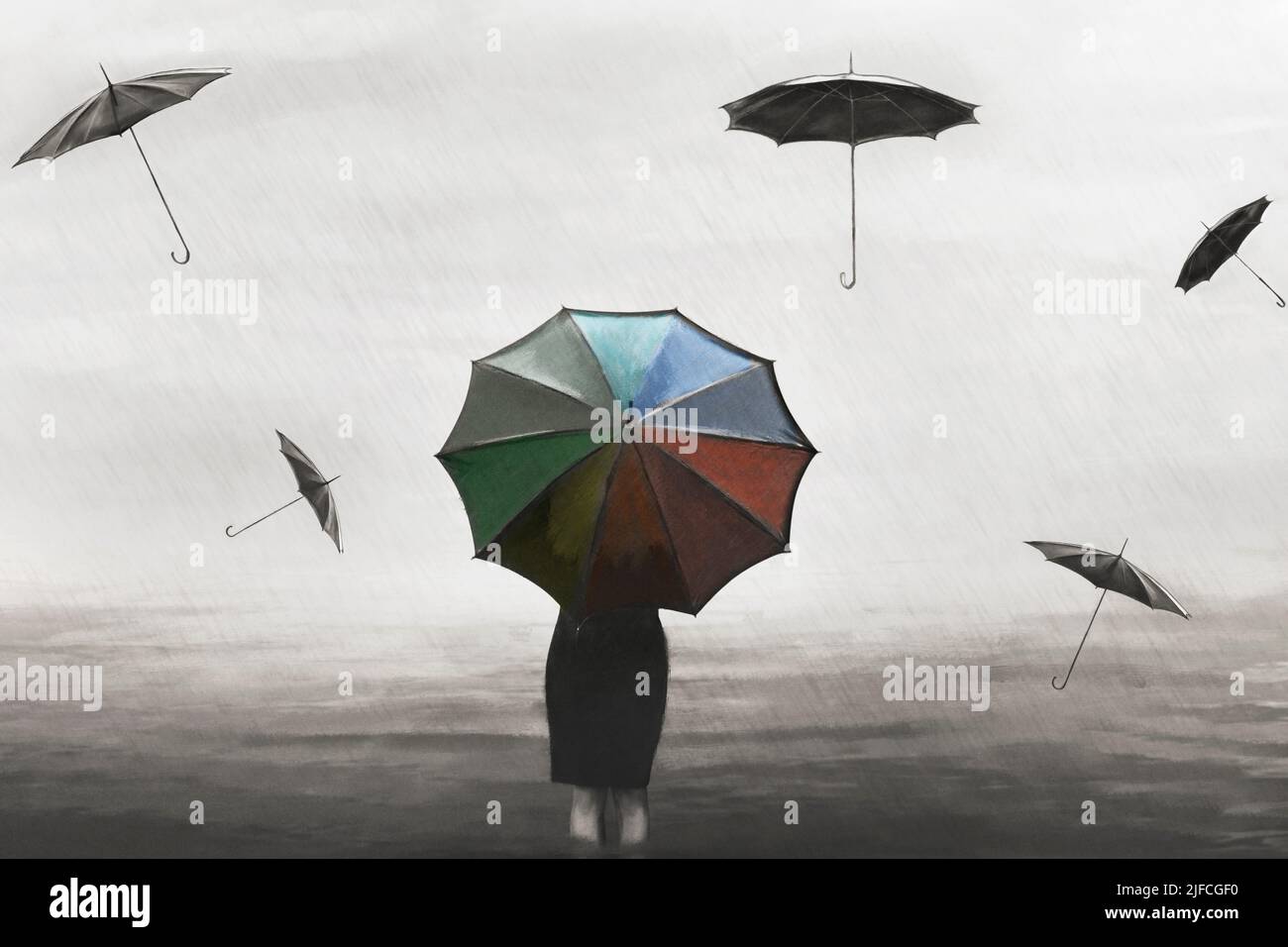surreal woman with colorful umbrella in the rain with flying black umbrellas around Stock Photo
