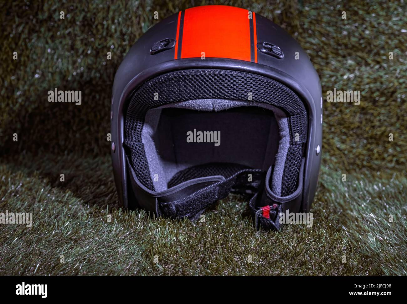 Lone black motorcycle helmet. Copy space Stock Photo Alamy
