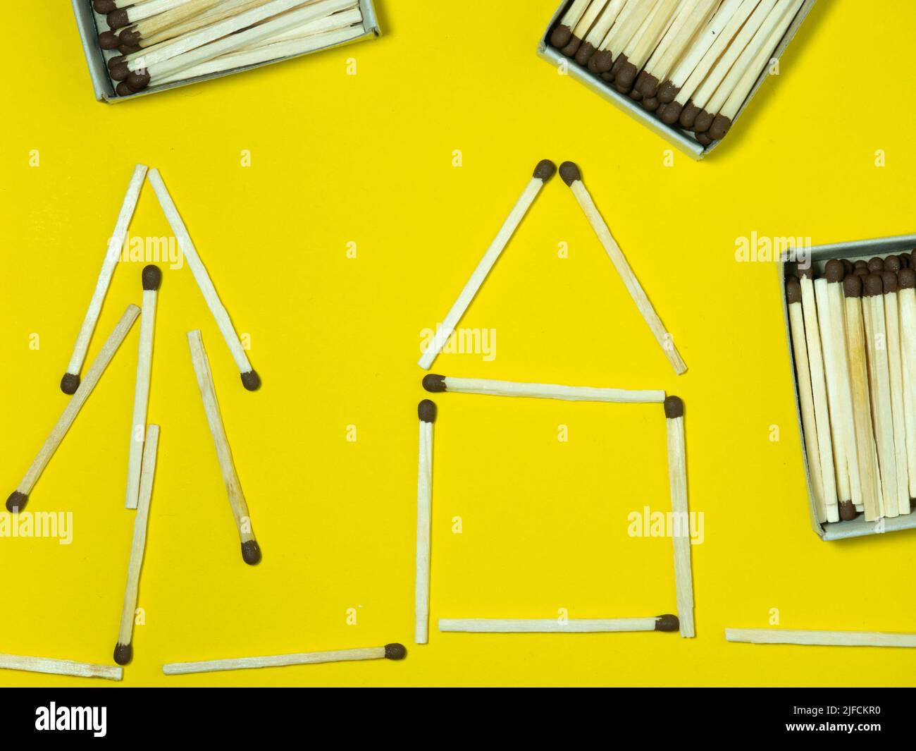 Matchsticks on a yellow background. Safe handling of fire. Fire dangers