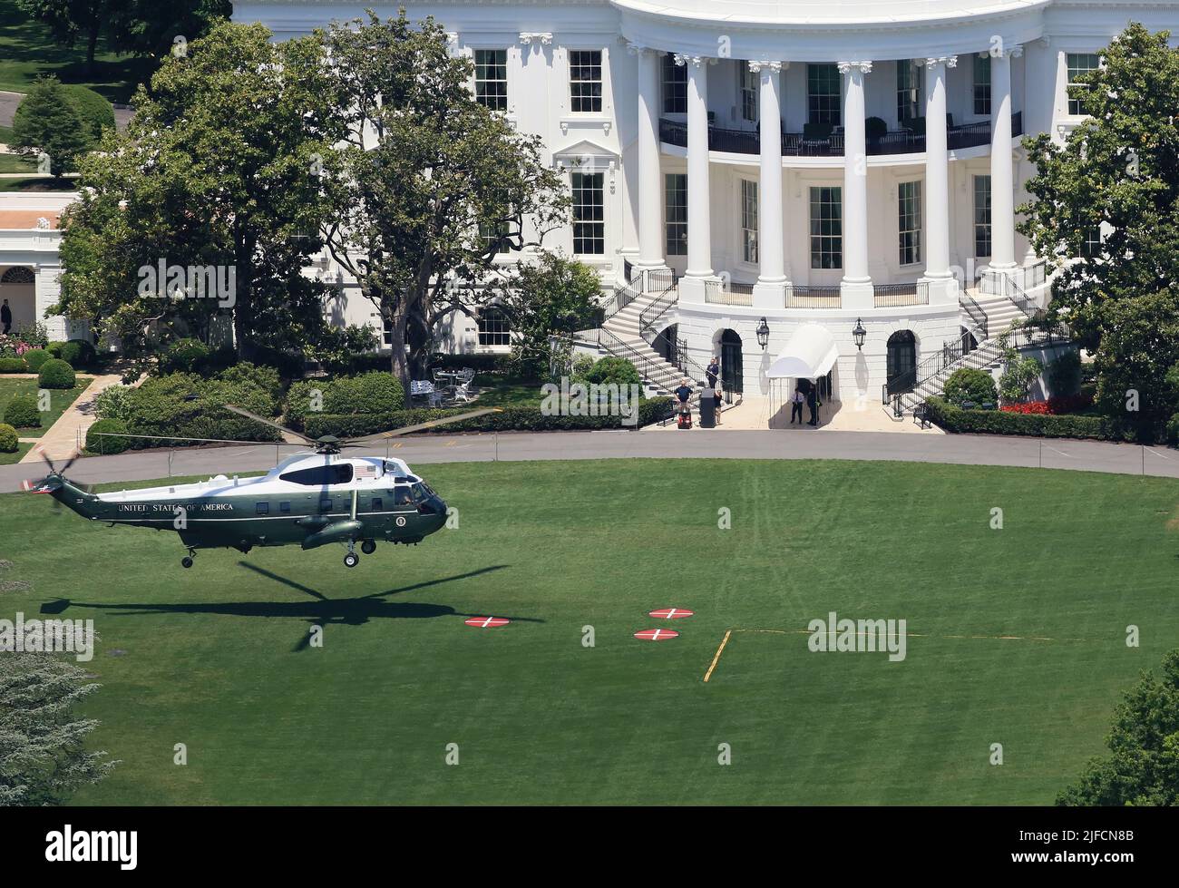 Aerial View of The Marine One helicopter of U.S. President landing on the South Lawn of The White House, Washington DC, USA. Stock Photo