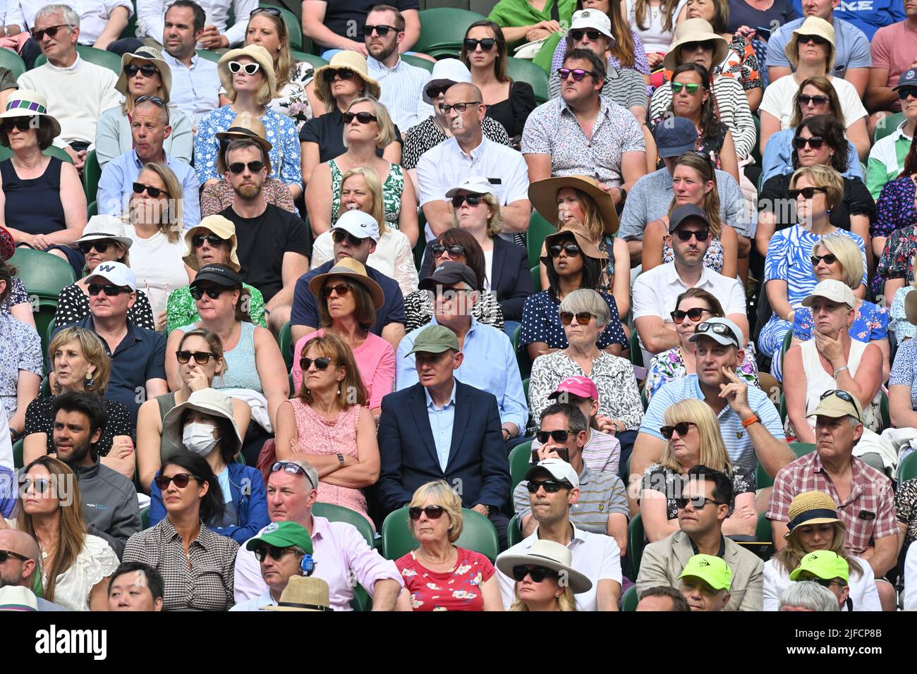 01 July 2022. London, United Kingdom.  Seated spectators watch centre court tennis from the Royal Box on day 5 of the Wimbledon Tennis Championships held at the All England Lawn Tennis and Croquet Club. Photo by Ray Tang. Stock Photo