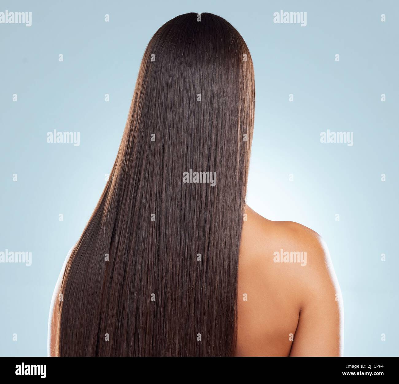 Pretty Rears In A Row Rear view of a brunette woman with long lush beautiful hair posing ...