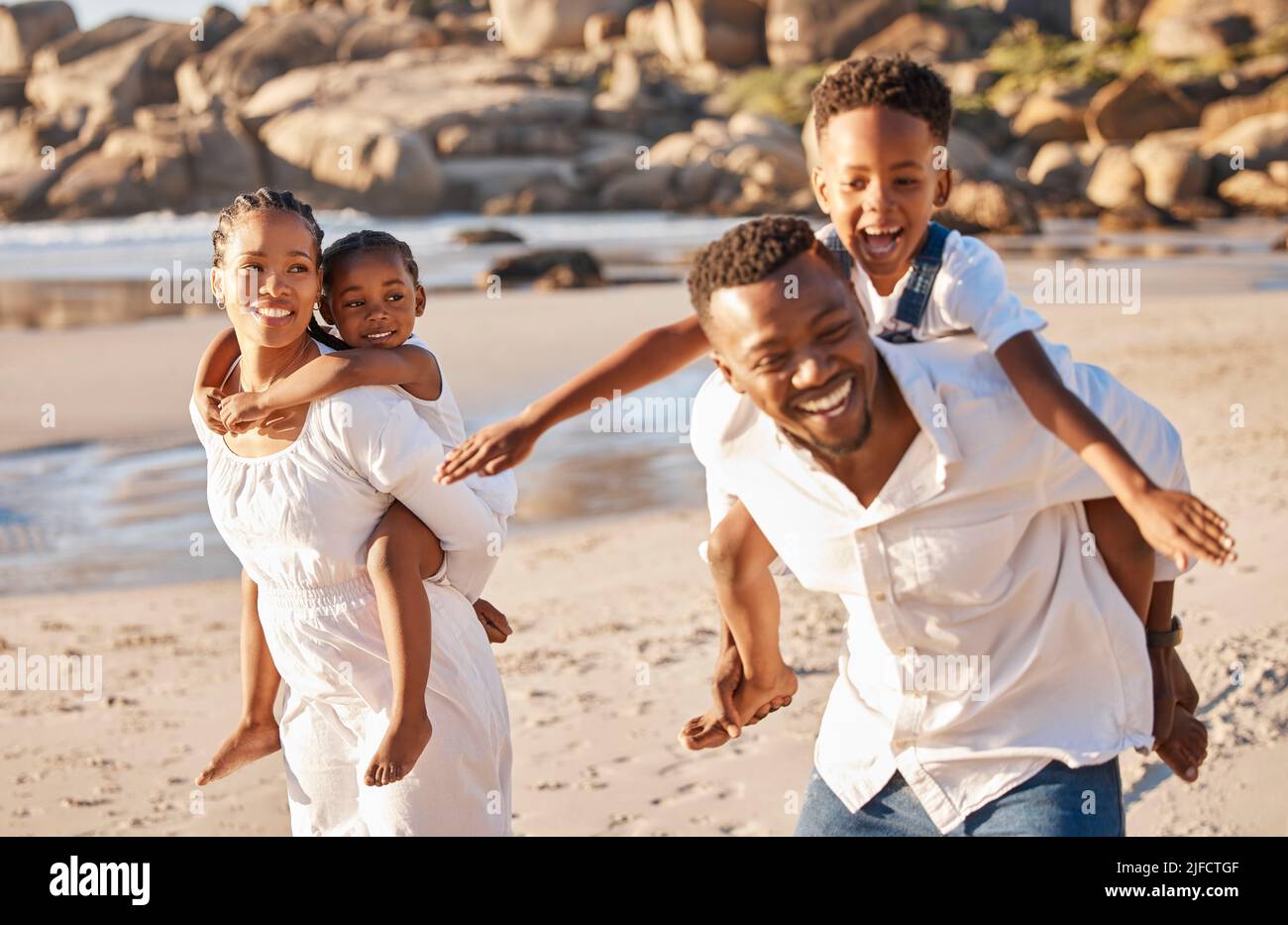 Happy african american family with two children enjoying vacation by