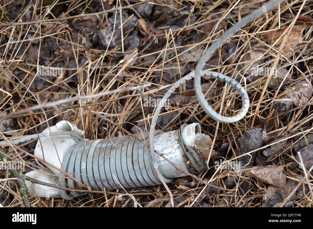 Dmytrivka, Kyiv region, Ukraine -04.03.2022: Undetonated part of an unguided rocket with combat striking elements that fell near residential buildings Stock Photo