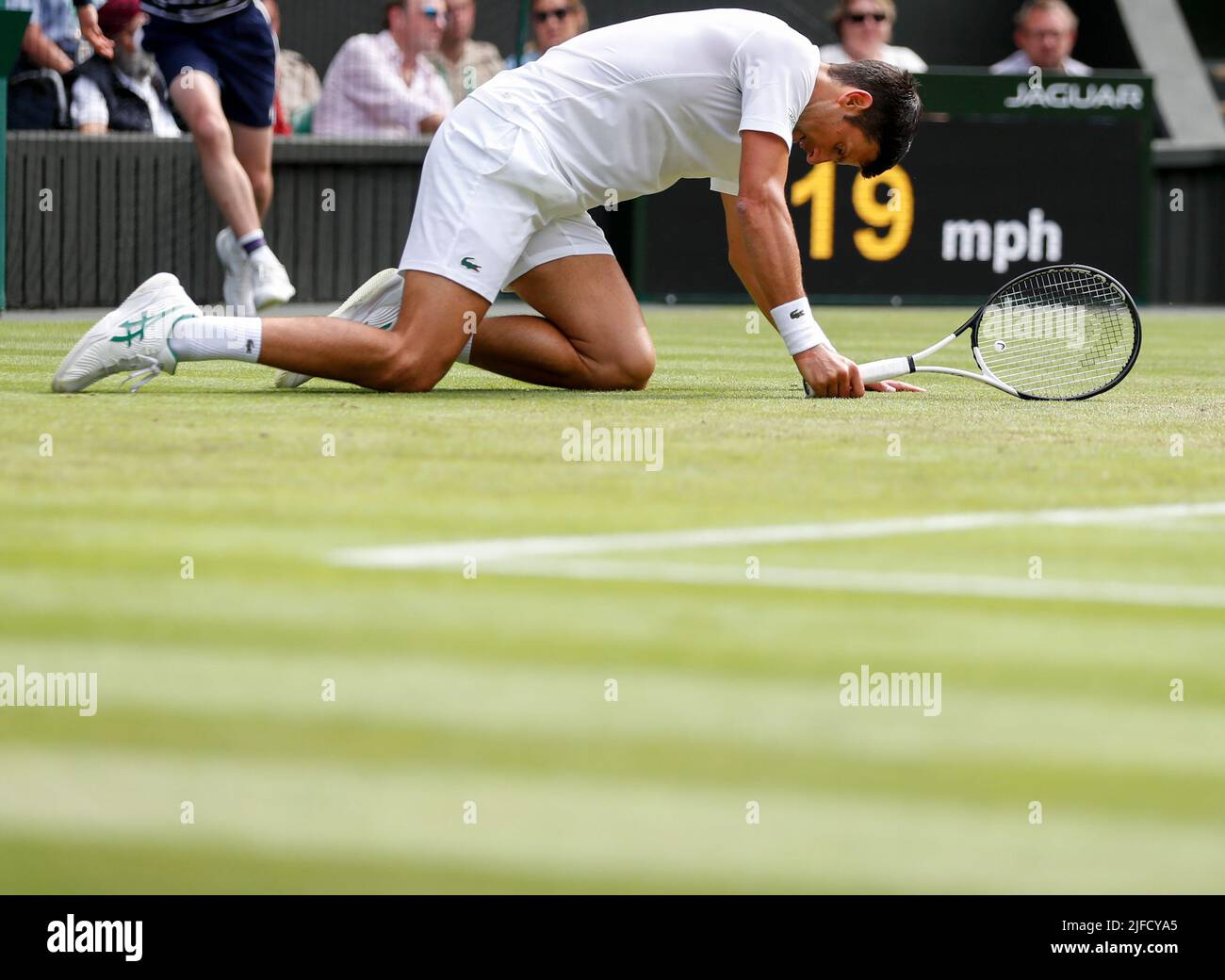 Djokovic falls hi-res stock photography and images
