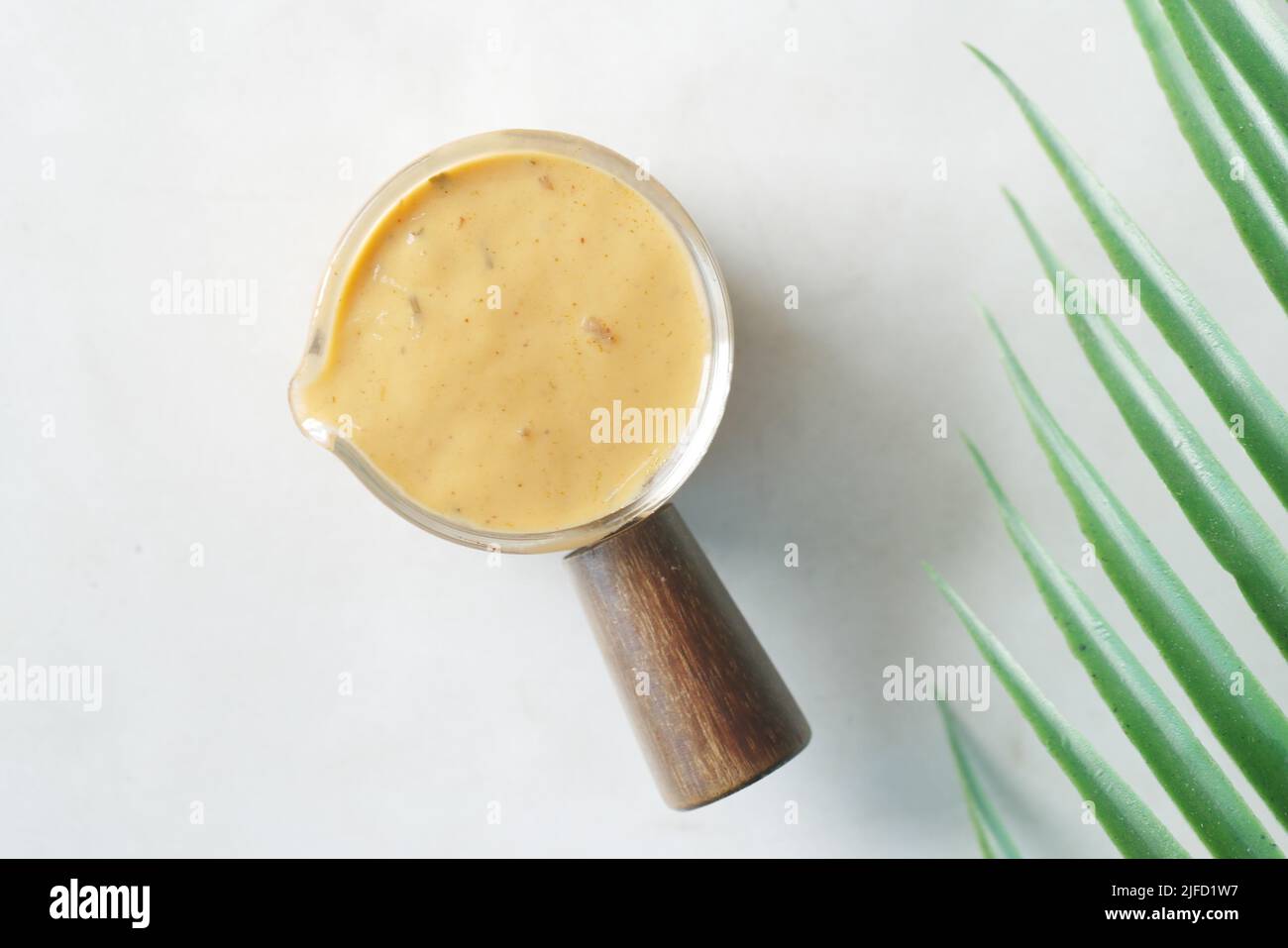 mustard mayonnaise in a glass jar on white Stock Photo Alamy