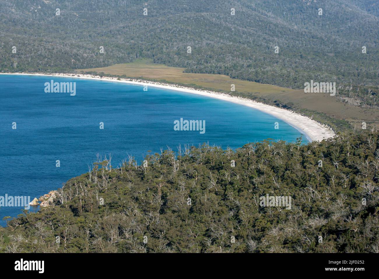 A view of Wineglass Bay in Freycinet National Park from the Wineglass Bay Lookout. Freycinet is located on the east coast of Tasmania in Australia. Stock Photo