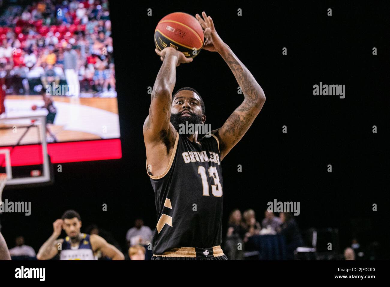 Newfoundland's #13 Terry Thomas (Guard) seen in action during the Edmonton Stingers rout of the Newfoundland Growlers in Canadian Elite Basketball Action with a historic victory. Edmonton Stingers 120-69  Fraser Valley Bandits. Stock Photo
