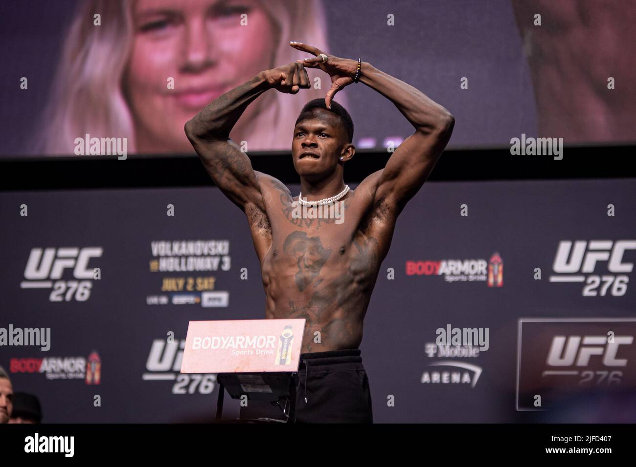 Las Vegas, USA. 01st July, 2022. LAS VEGAS, NV - July 1: Israel Adasenya Stands one the Scales at the UFC International Fight Week: Ceremonial Weigh Ins at T-Mobile Arena, ahead of his title bout on July 2nd, Las Vegas, NV, United States. (Photo by Matt Davies/PxImages) Credit: Px Images/Alamy Live News Stock Photo
