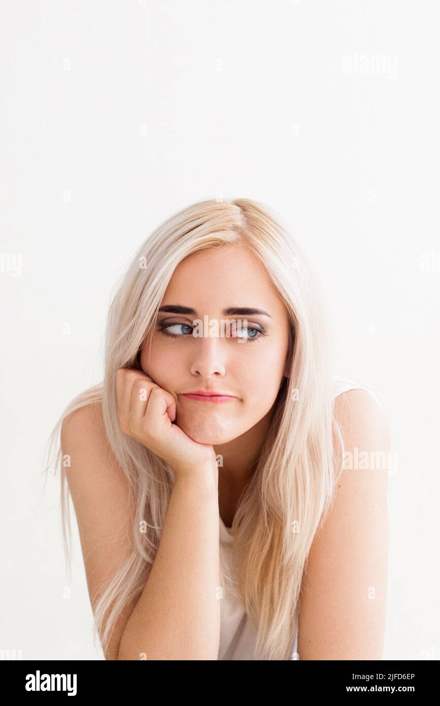 Beautiful woman with boring look, copy space Stock Photo