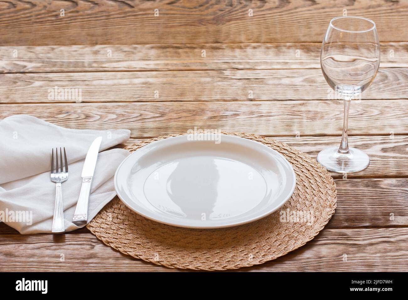 Fine empty tableware on wooden background Stock Photo