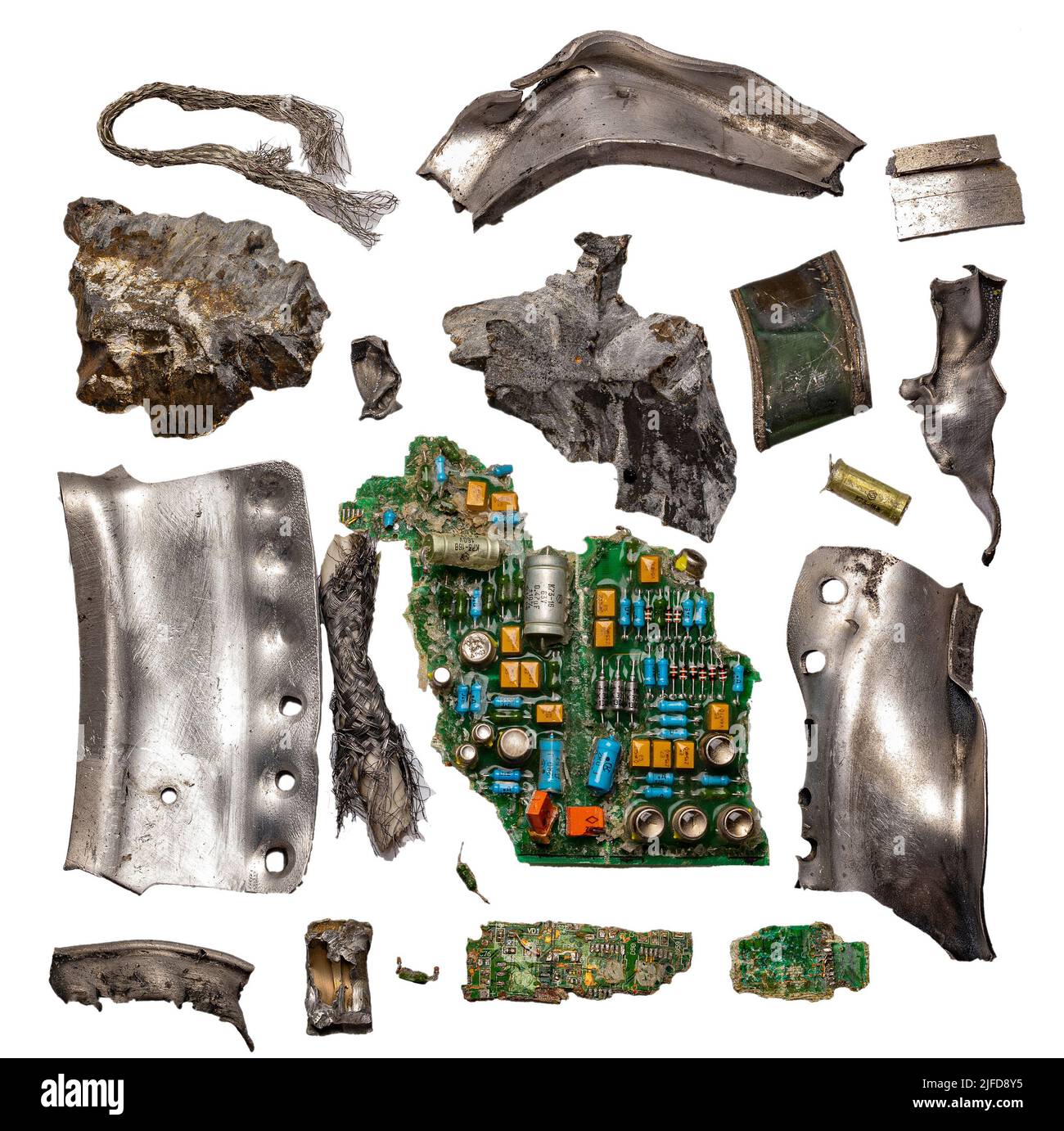 Fragments of the Russian-made Kh-22 anti-ship cruise missile. Debris of a high-explosive cumulative warhead, a jet engine and electronic boards with e Stock Photo