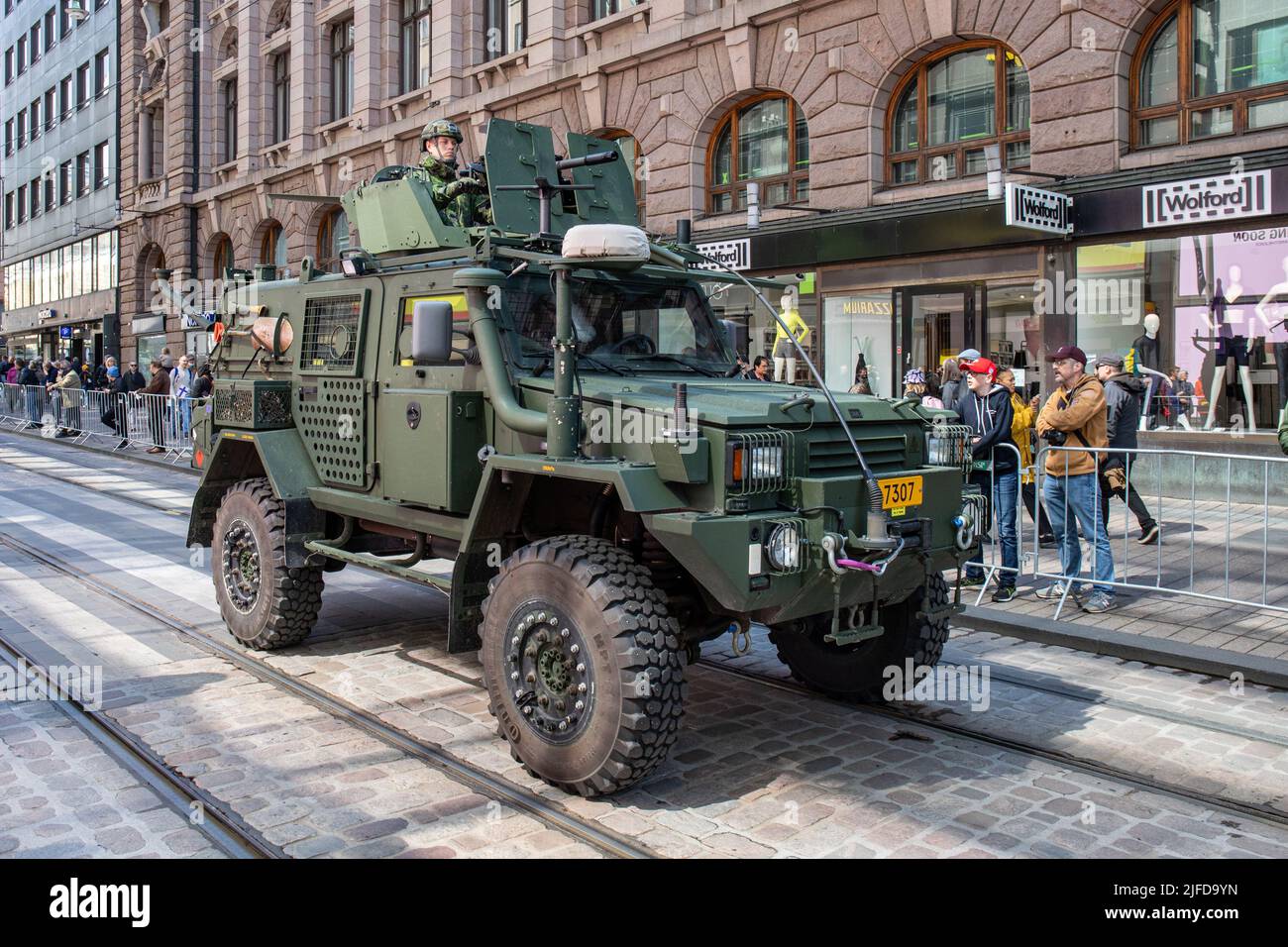 BAE SYSTEMS RG32M light-armoured all-terrain vehicle at Defence Forces' Flag Day military parade in Aleksanterinkatu, Helsinki, Finland Stock Photo