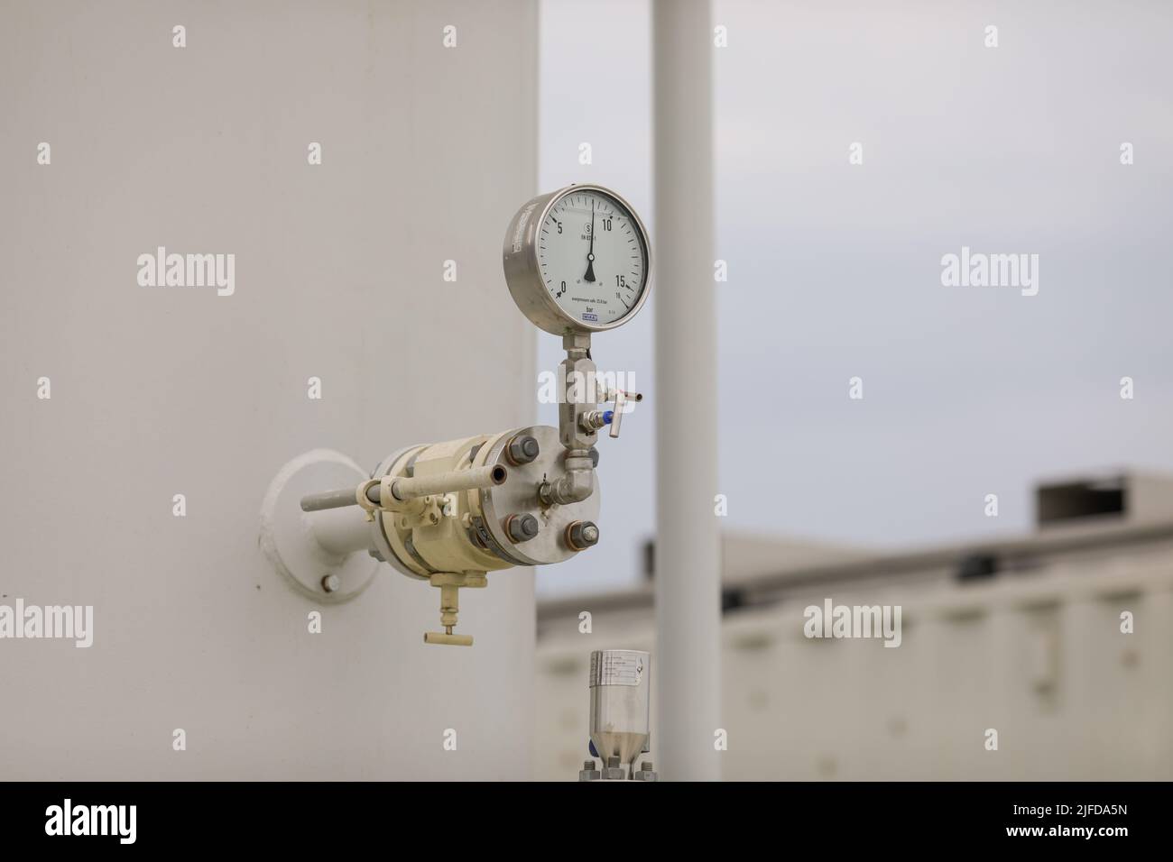Vadu, Romania - June 28, 2022: Details with a pressure gauge at a gas treatment plant. Stock Photo
